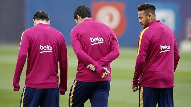 Messi, Sua´ez y Neymar durante el entrenamiento de ayer