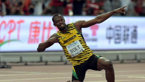 Usain Bolt celebra su victoria en los Mundiales de Atletismo de Pekín