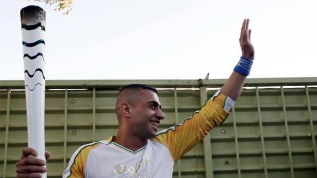 Ibrahim Al Hussein, cuando portó la antorcha olímpica al paso por su campo de refugiados