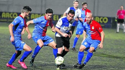 El Langreo, en un partido ante el Tuilla