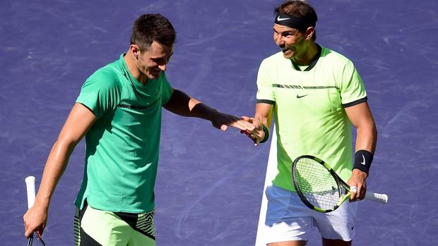 Nadal y Tomic caen en dobles