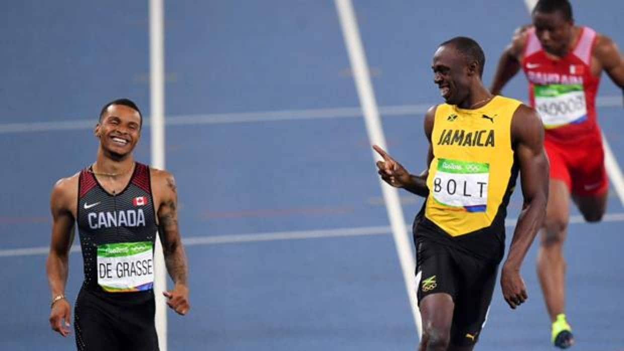 De Grasse, con Bolt, en los Juegos Olímpicos de Río 2016