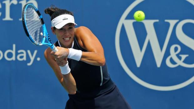 Muguruza salva tres bolas de partido y avanza de ronda