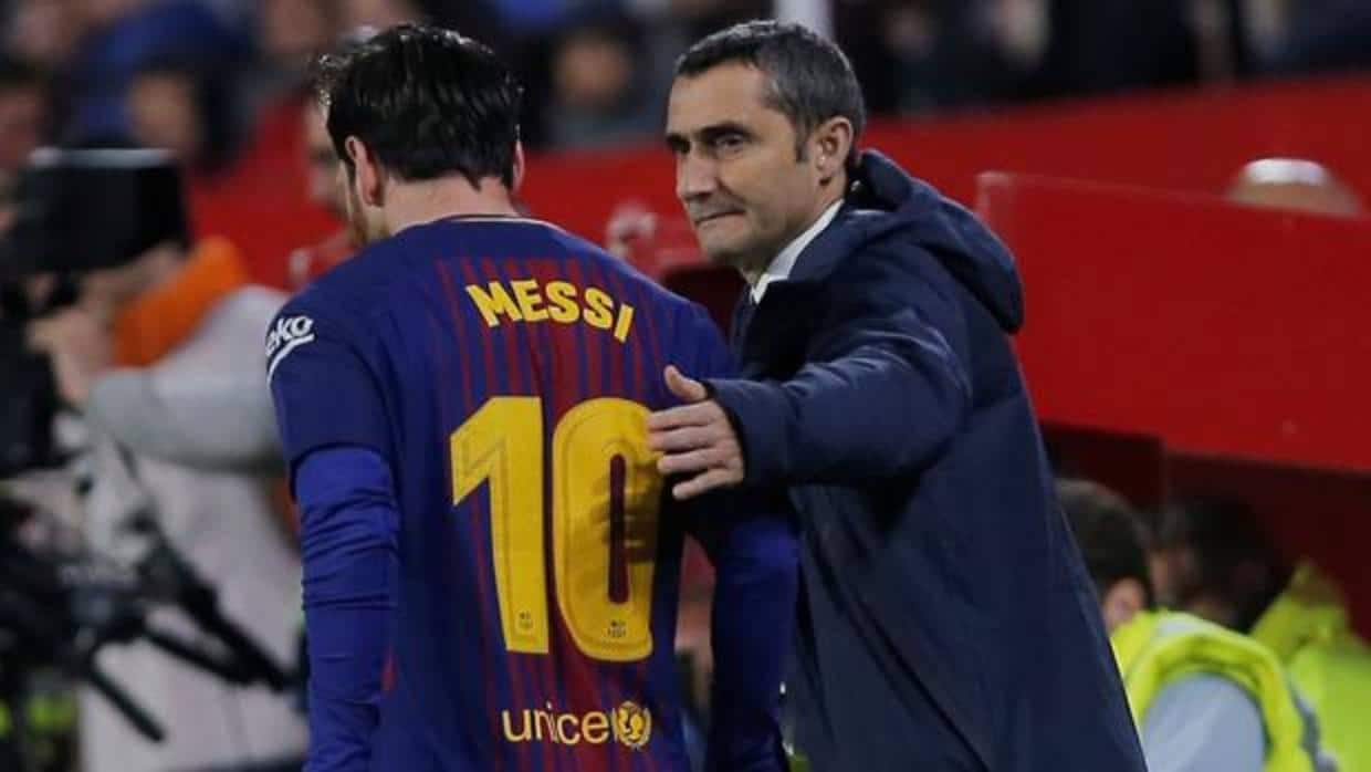 Valverde y Messi durante un partido del Barcelona