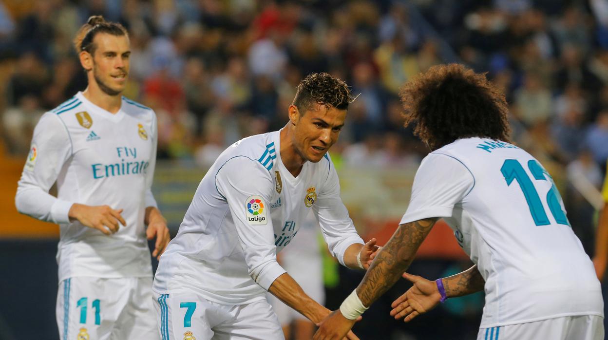 Cristiano y Marcelo celebran un gol