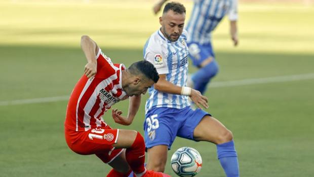 El Málaga gana con cabeza