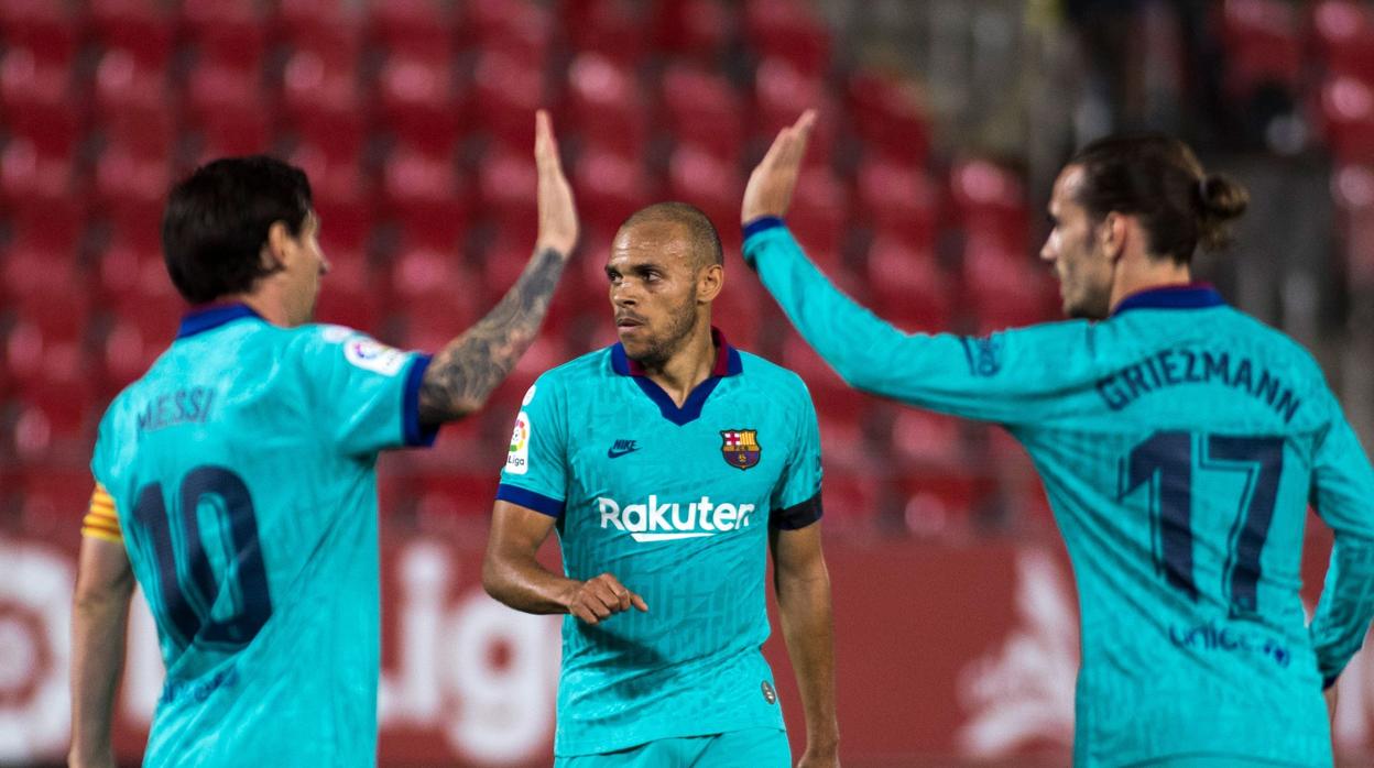 Messi, Braithwaite y Griezmann durante un partido esta temporada