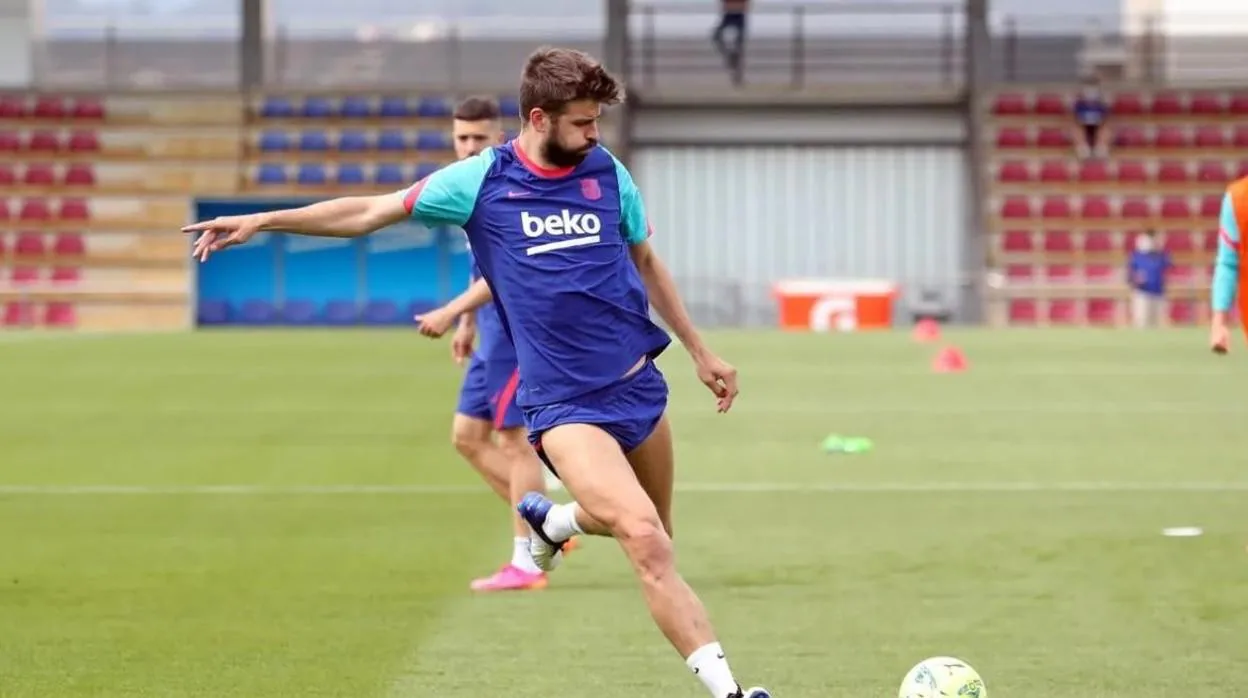 Piqué y Alba, durante un entrenamiento del Barcelona