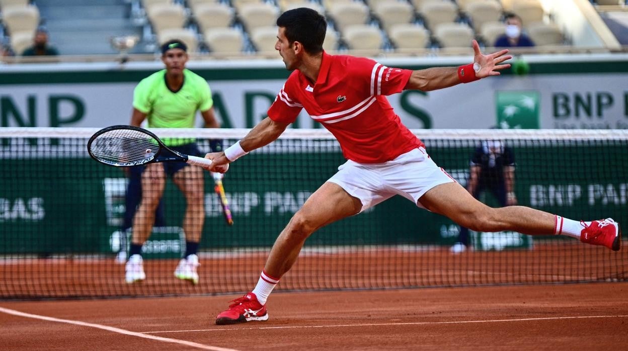 Nadal y Djokovic, durante un partido