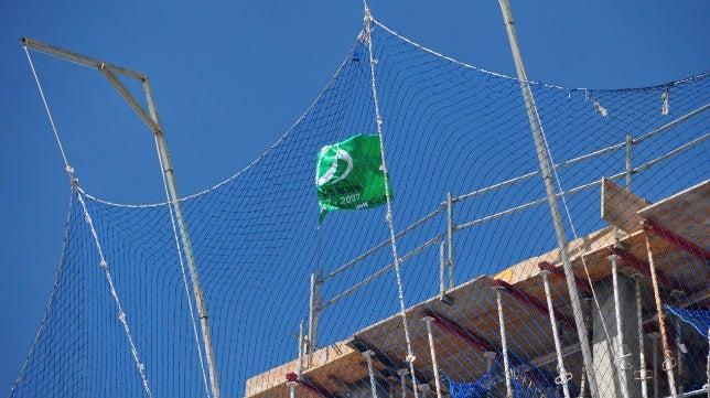 Una bandera del Betis en territorio cadista