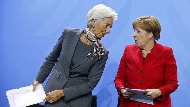 La directora gerente del FMI, Christine Lagarde, y la canciller alemana, Angela Merkel