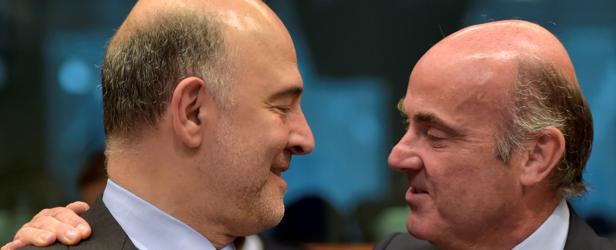 El comisario de Economía, Pierre Moscovici, junto al ministro del ramo, Luis de Guindos