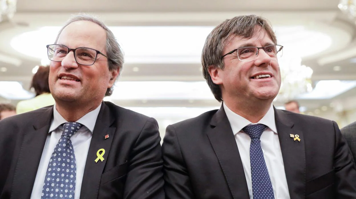 Quim Torra, presidente de la Generalitat, y Carles Puigdemont, expresidente de la Generalitat