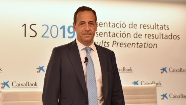 Caixabank recorta sus beneficios un 52% por el impacto del ERE