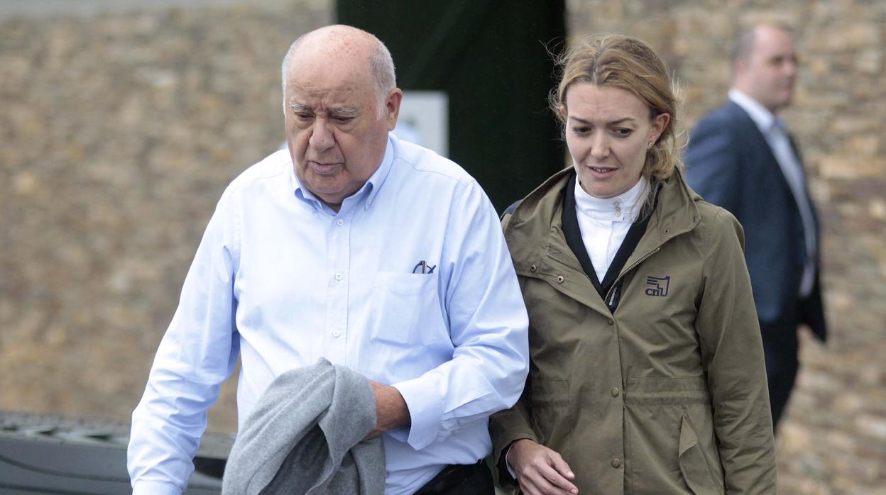 Amancio Ortega junto a su hija Marta