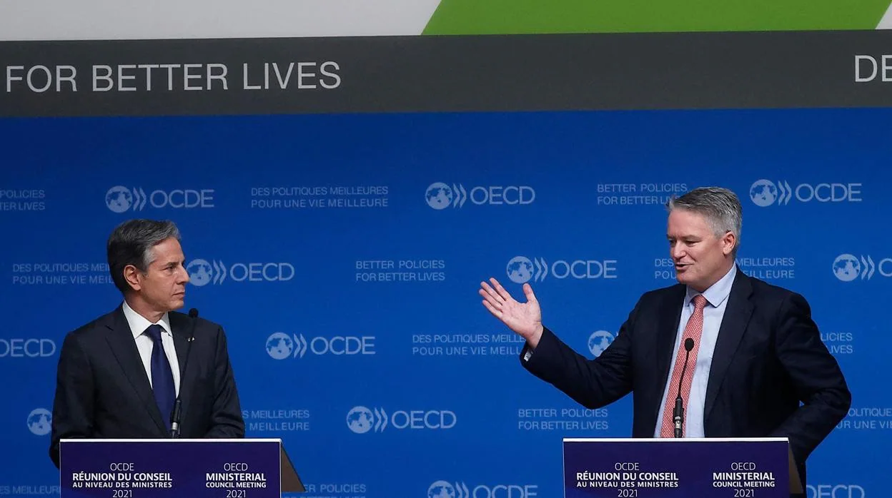 El secretario de estado estadounidense, Anthony Blinken y el secretario general de la OCDE, Mathias Cormann y
