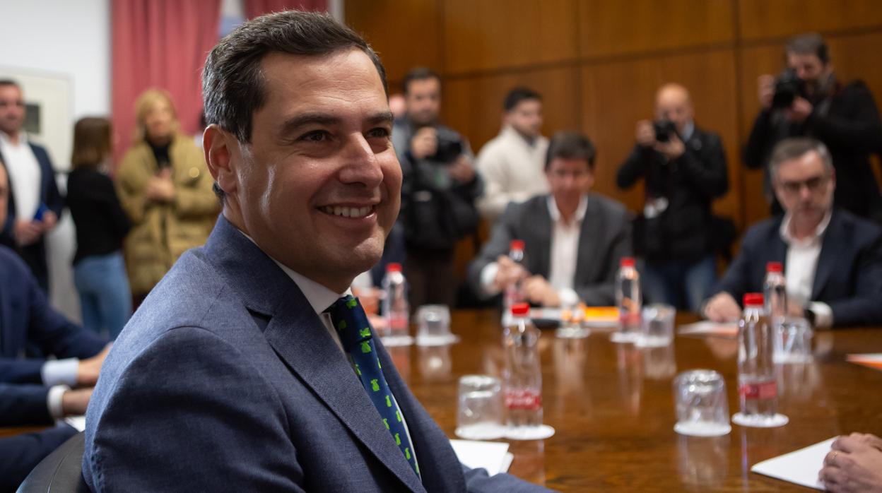 El presidente del PP andaluz, Juanma Moreno, durante una de las reuniones mantenidas con Ciudadanos