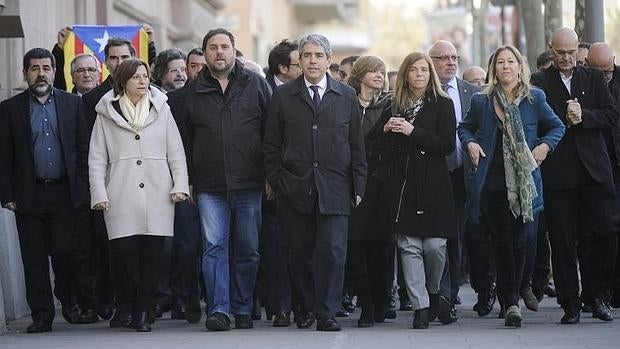 El exconsejero catalán Francesc Homs, en el centro, el pasado 7 de marzo antes de declarar por el 9-N