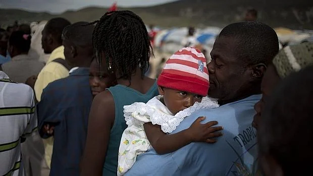 Refugiados haitianos desplazados en 2010 ante la llegada de la tormenta tropical «Tomas»