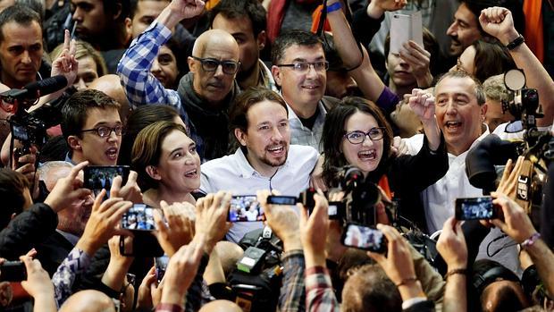 Imagen de Errejón, Iglesias, Oltra y Balvodí en la campaña de las elecciones de diciembre