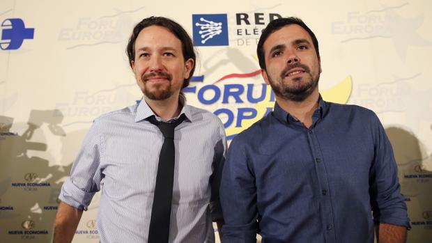 Pablo Iglesias y Alberto Garzón durante un desayuno informativo de Fórum Europa