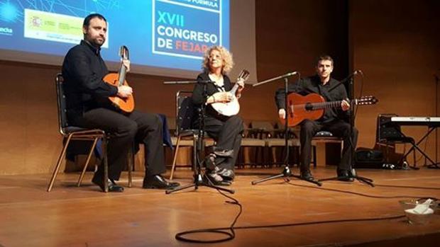 El trío, durante el concierto de clausura del congreso