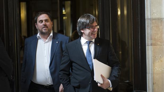 Oriol Junauqeras y Carles Puigdemont, en el Parlament