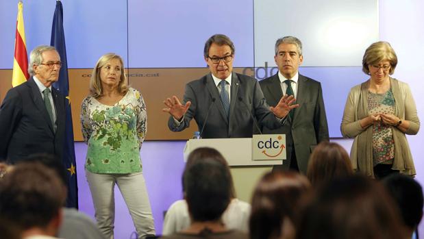 Mas, Ortega y Rigau, en una rueda de prensa acompañados por Francesc Homs y Xavier Trias