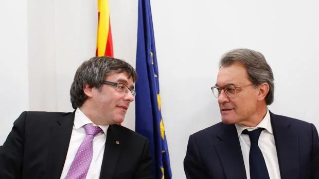 Artur Mas y Carles Puigdemont, durante una reunión de la cúpula del PDECat