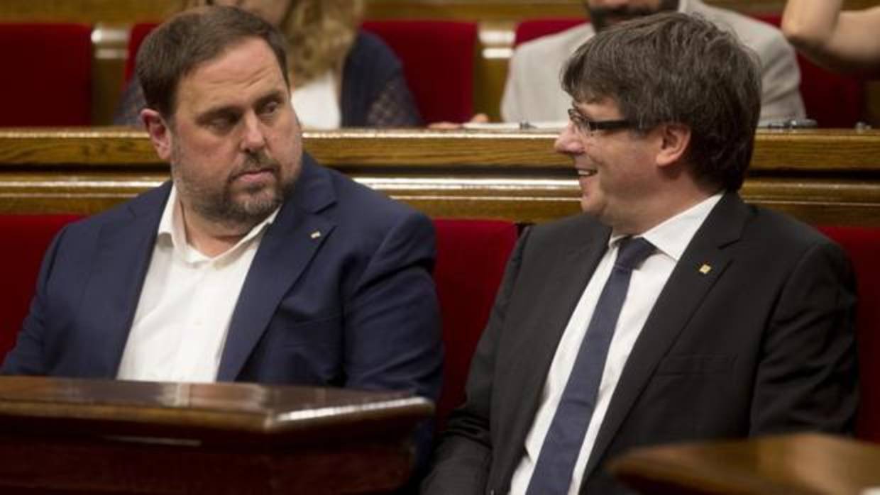 Junqueras y Puigdemont, en el Parlamento de Cataluña