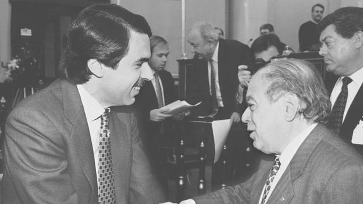 José María Aznar junto a Jordi Pujol en 1997