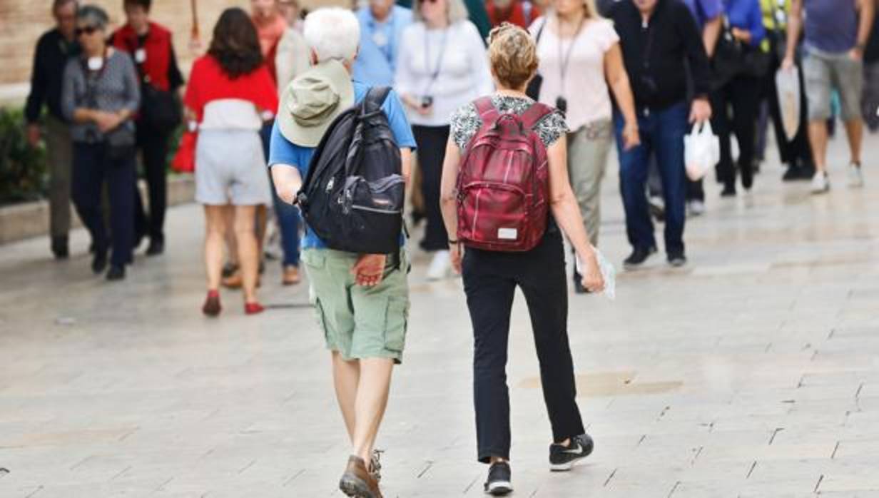 Imagen de un grupo de turistas tomada en el centro de Valencia