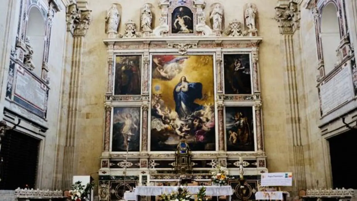 El cuadro de San Agustín, abajo a la derecha del retablo