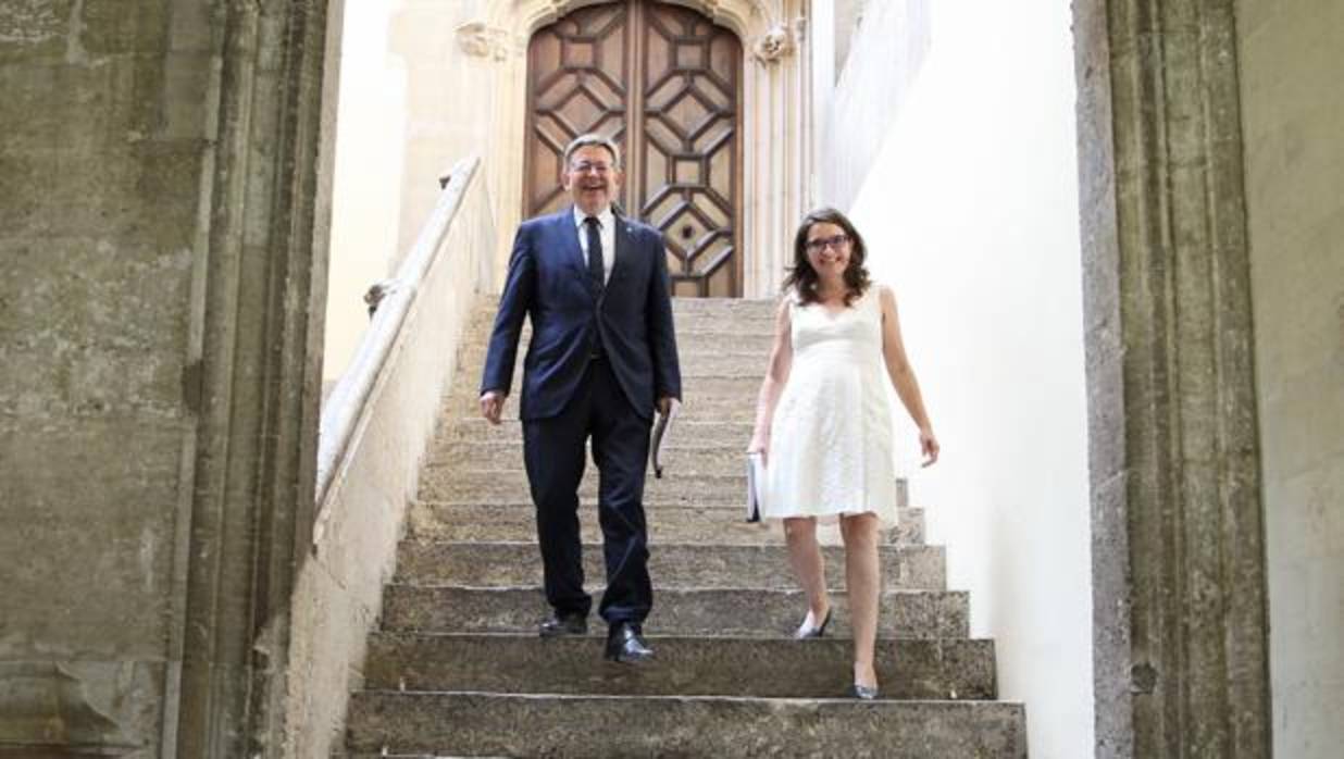 Imagen de Ximo Puig y Mónica Oltra tomada en el Palau de la Generalitat