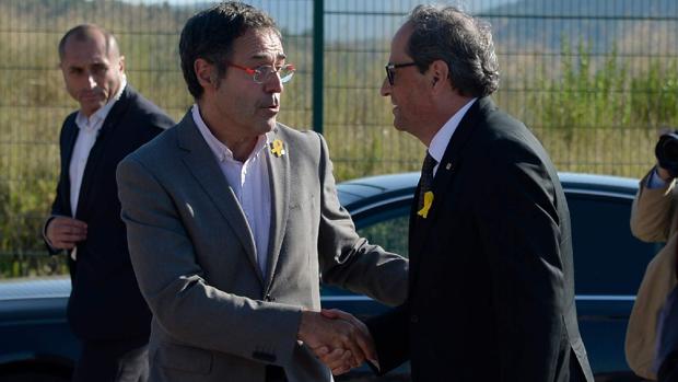 El responsable de prisiones de Cataluña recibe a Torra con el lazo amarillo