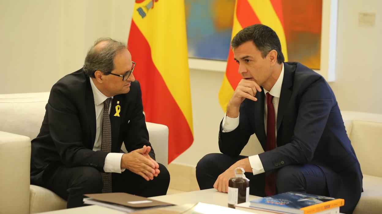 Pedro Sánchez y el presidente de la Generalitat, Quim Torra, reunidos en La Moncloa este 9 de julio