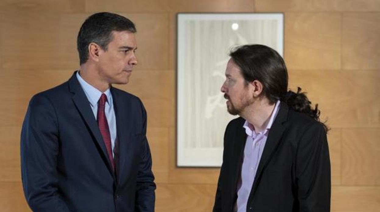 El presidente en funciones, Pedro Sánchez, y el líder de Podemos, Pablo Iglesias, en una imagen de archivo