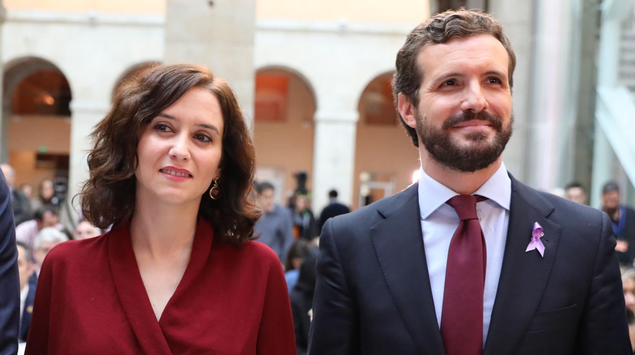 La presidenta de la Comunidad de Madrid, Isabel Díaz Ayuso, y el líder del PP, Pablo Casado