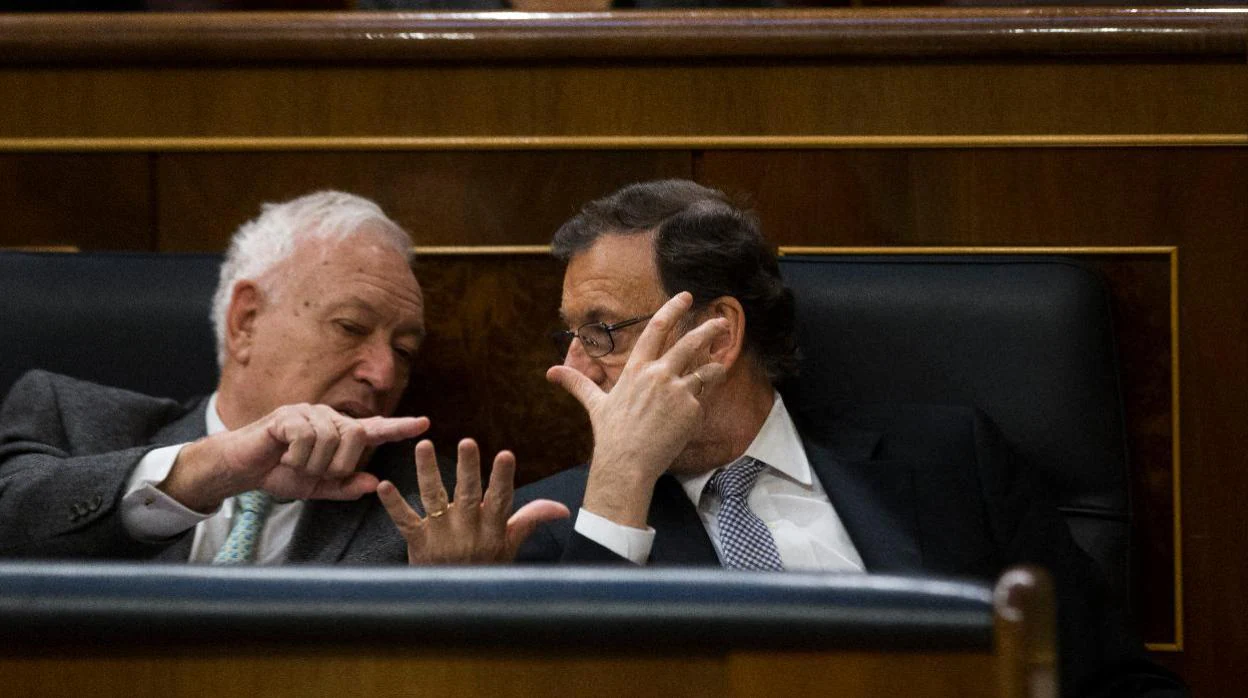 José Manuel García-Margallo y Mariano Rajoy, en el Congreso, en una foto de archivo