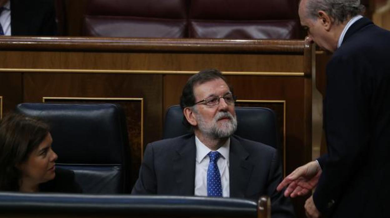 Mariano Rajoy y Fernández Díaz, en una imagen de archivo