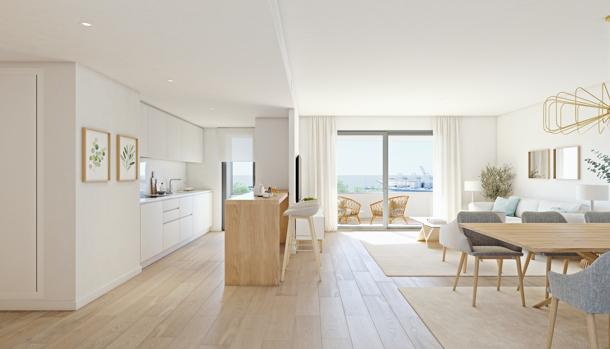 Salón con cocina integrada de las viviendas de la promoción Savery de AEDAS Homes en Alicante, en el sector Benalúa Sur