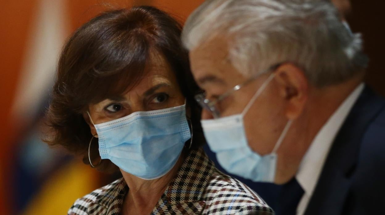 Carmen Calvo y Juan José González Rivas