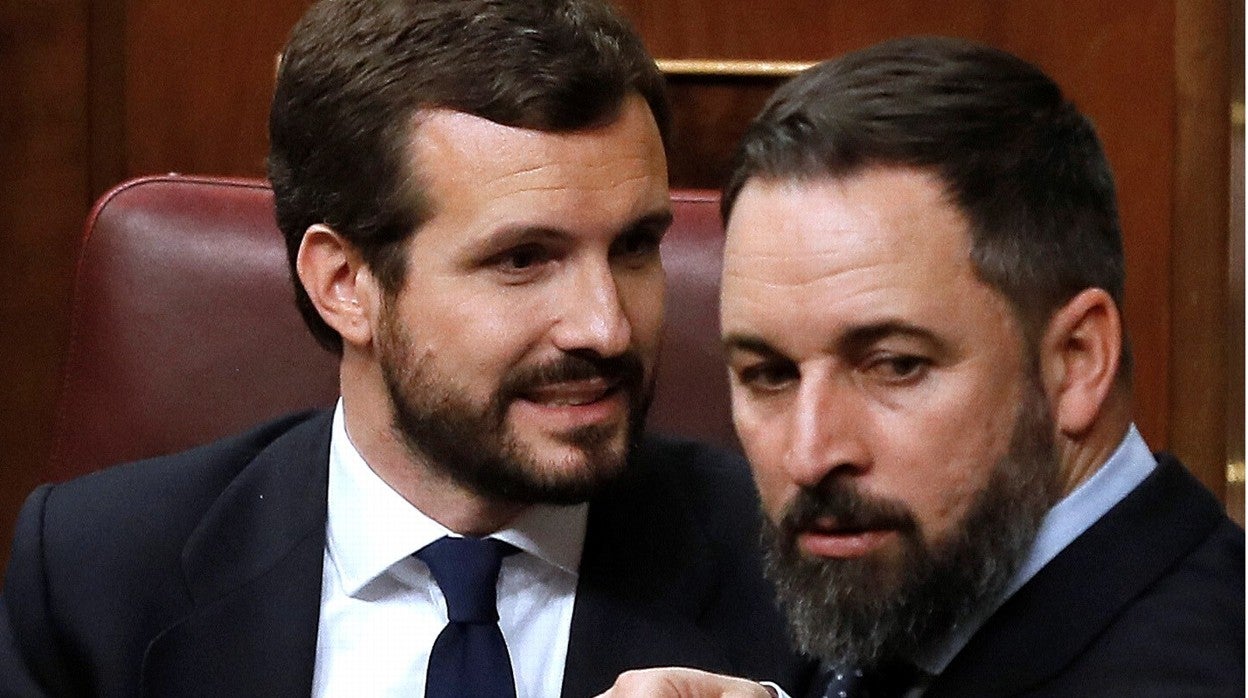 Los presidentes del PP y de Vox, Pablo Casado y Santiago Abascal, en una imagen de archivo