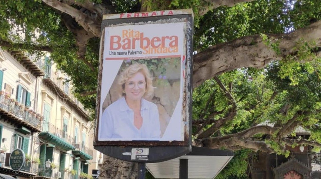 Imagen de un cartel electoral de Rita Barbera en Palermo