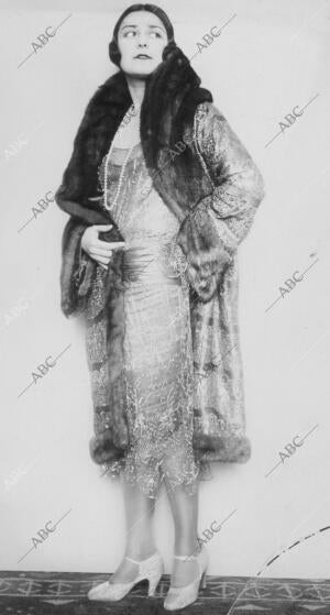 Gabán de brocado de oro guarnecido de zorro Dorado