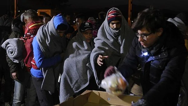Un grupo de refugiados en Grecia