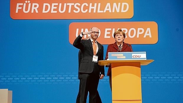 Merkel maniobra para evitar un voto de castigo de la CDU