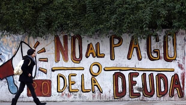 Un grafiti en Argentina en contra del pago de la deuda