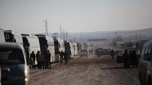 Autobuses de desplazados de la zona de Homs