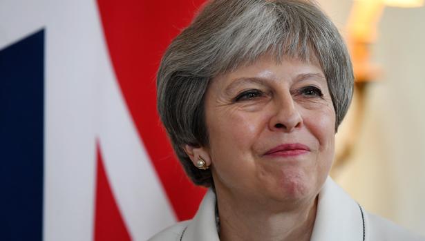 May defiende en el Parlamento británico la intervención militar en Siria